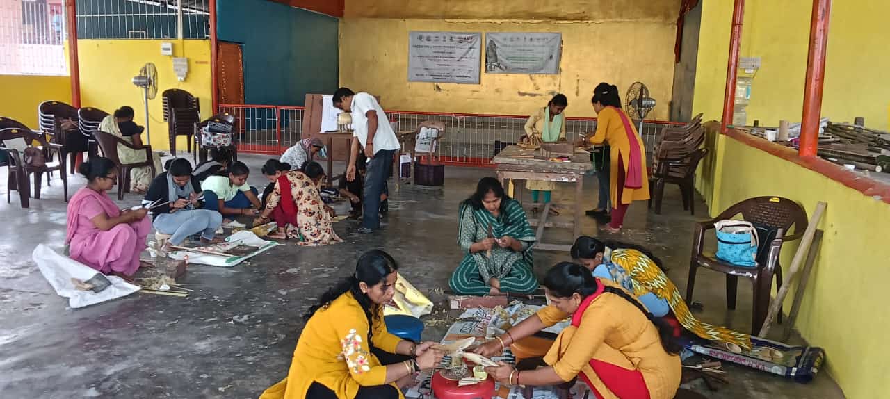 Trainees involved in the processing of bamboo
